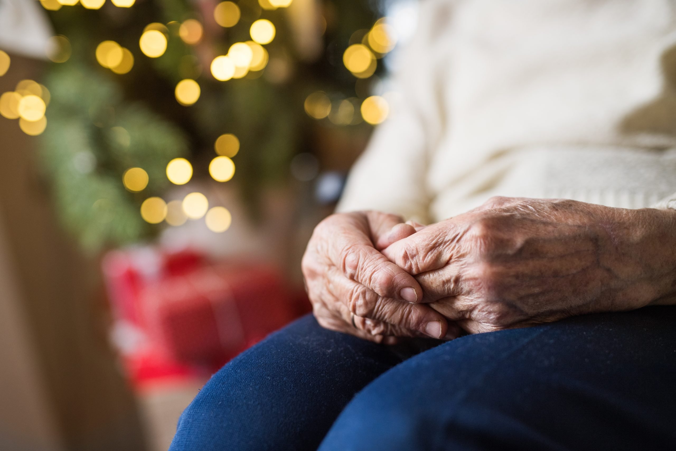 A Close-up Of A Senior Woman Sitting At Home At Christmas Time.