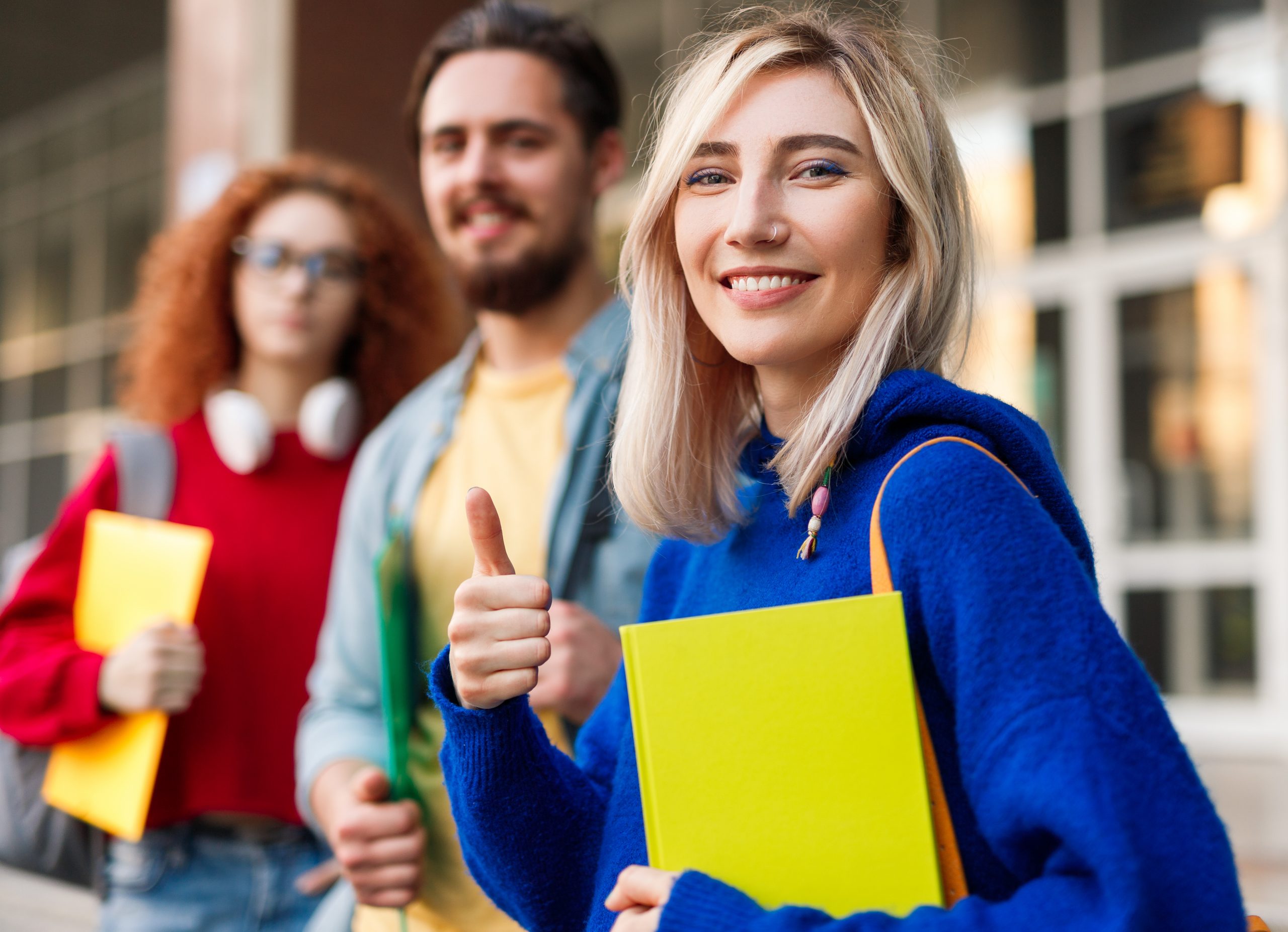 Cheerful student approving university admission campaign