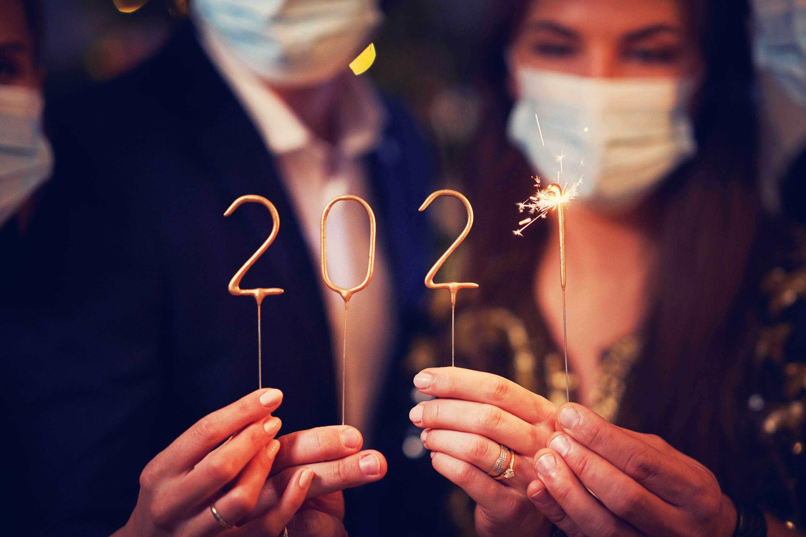 Two beautiful young couples having fun at New Year’s Eve Party