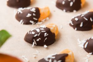 Making chocolate-dipped mandarin slices